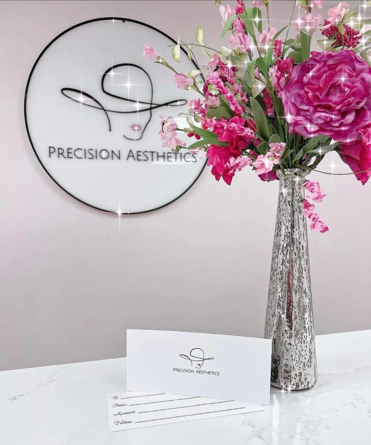 Retail display and gift certificates at Precision Aesthetics